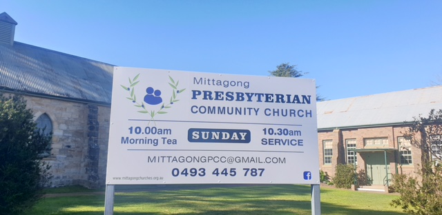 The Mittagong Presbyterian Community Church sign in front of the church